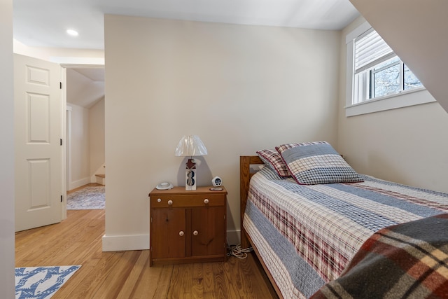 bedroom with light hardwood / wood-style floors