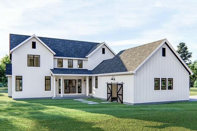 rear view of house with a yard