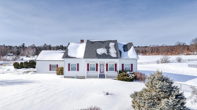 view of new england style home