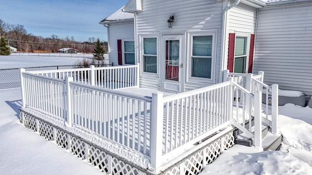 view of snow covered deck