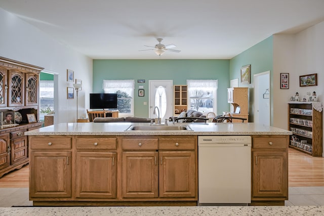 kitchen featuring sink, ceiling fan, plenty of natural light, and dishwasher