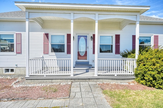 11 Sunrise Dr, Hallowell, ME 04347 - view of front facade featuring a porch and a shingled roof