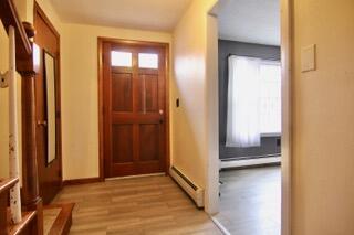 doorway featuring light hardwood / wood-style flooring