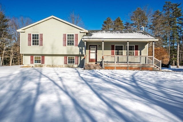 split level home featuring a porch