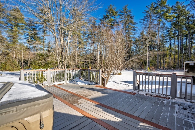 view of snow covered deck