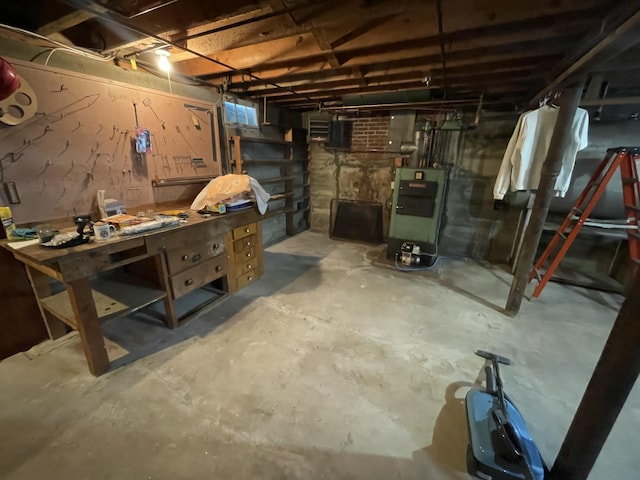 basement with a workshop area