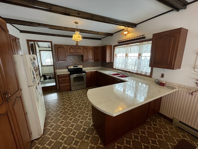 kitchen featuring stainless steel electric range oven, a baseboard radiator, hanging light fixtures, white fridge, and kitchen peninsula