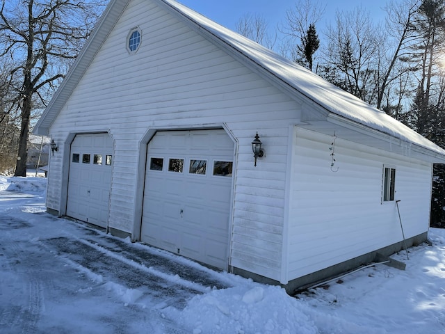 view of snow covered garage