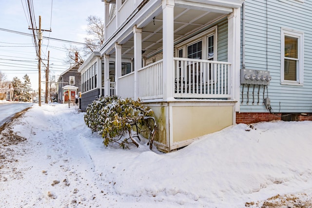 view of snow covered property