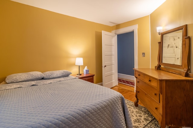 bedroom with light hardwood / wood-style floors