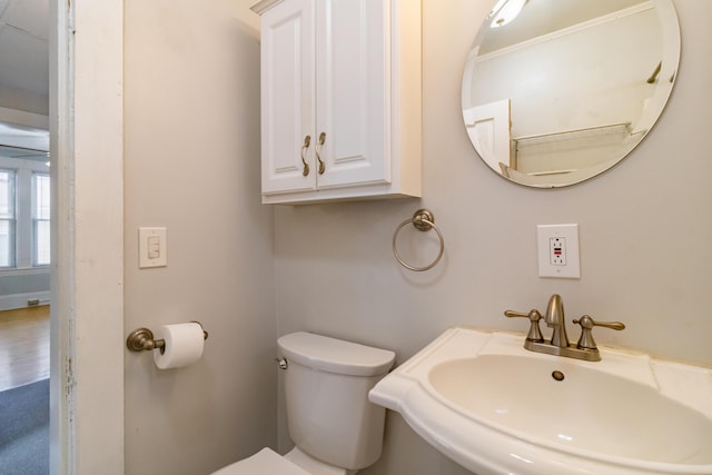 bathroom with sink and toilet