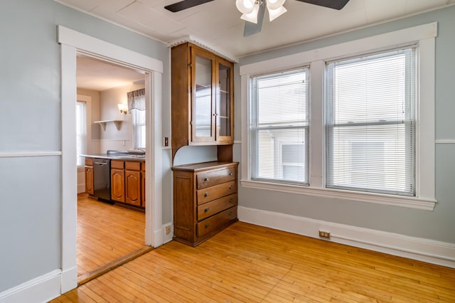 interior space with light hardwood / wood-style flooring and ceiling fan