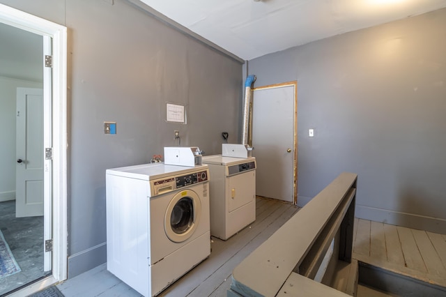 laundry room with washing machine and clothes dryer