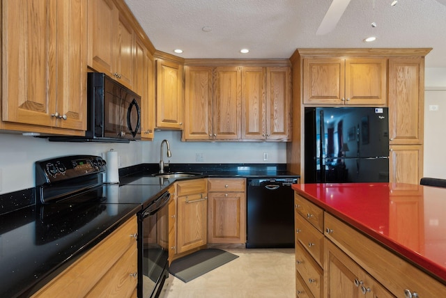 kitchen with ceiling fan, sink, a textured ceiling, and black appliances