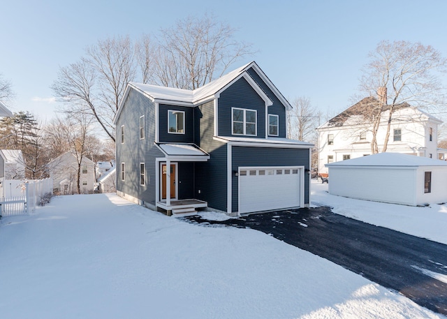 front facade with a garage