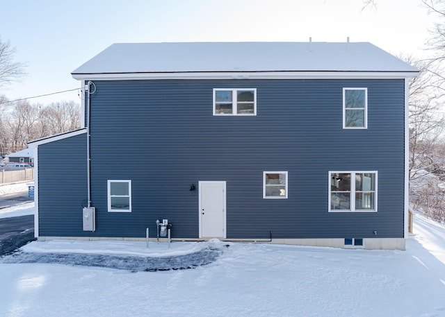 view of snow covered property