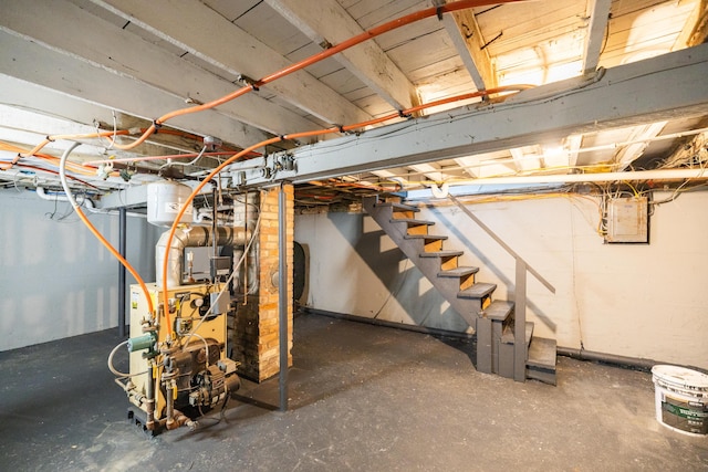 unfinished below grade area with stairs, a heating unit, and electric panel