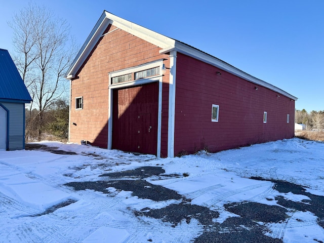 view of snow covered garage