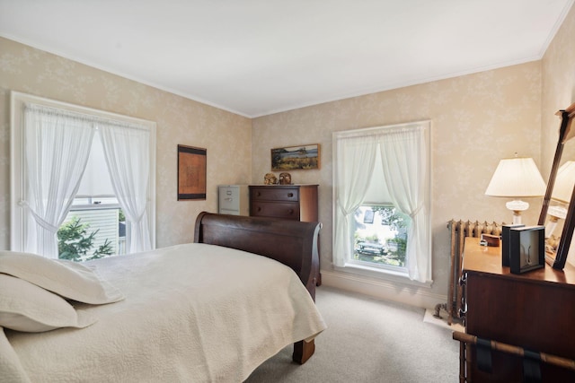 carpeted bedroom featuring ornamental molding and radiator