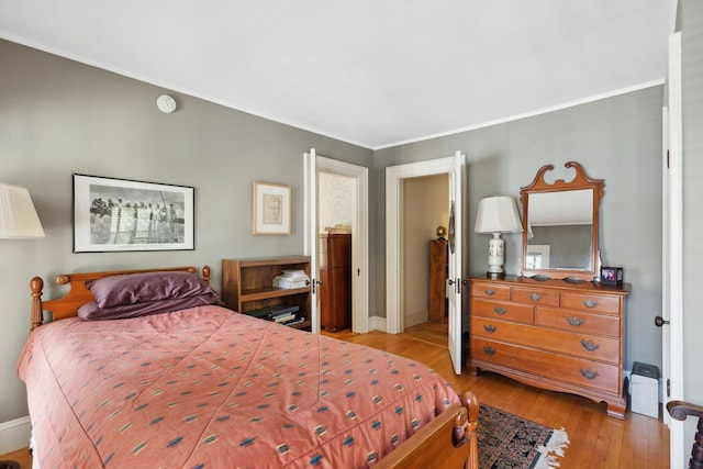 bedroom featuring light wood-type flooring