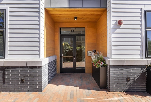 property entrance featuring french doors