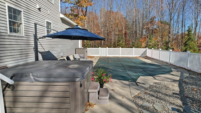 view of pool featuring a hot tub