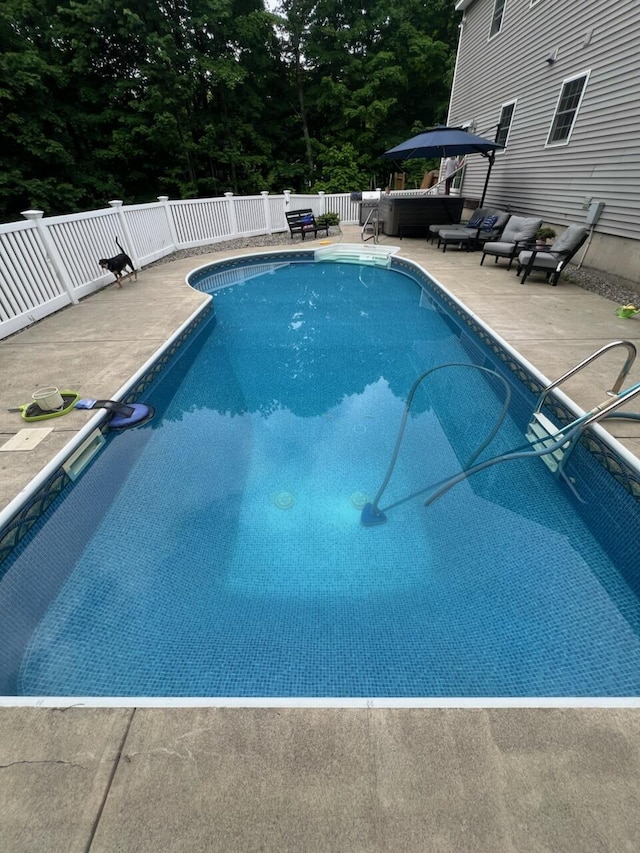 view of swimming pool featuring an outdoor hangout area and a patio area