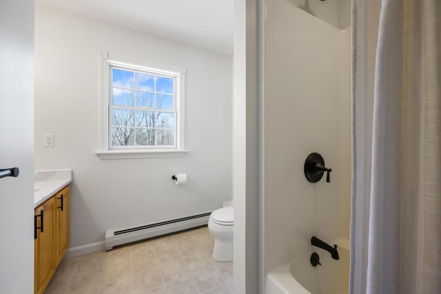 bathroom featuring vanity, a baseboard heating unit, tile patterned flooring, and toilet