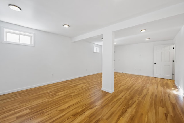 basement featuring light wood-type flooring