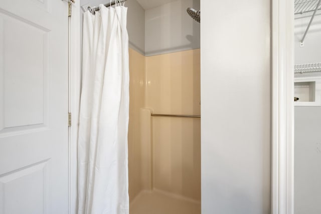 bathroom with walk in shower