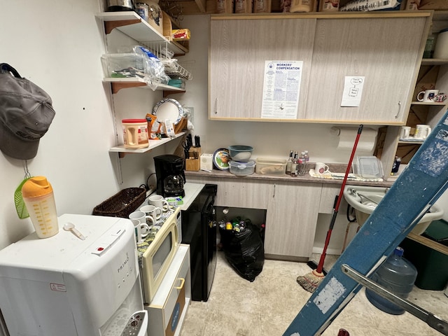 kitchen featuring light brown cabinets