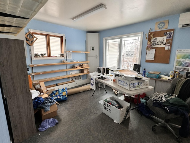 office space with a wall mounted air conditioner