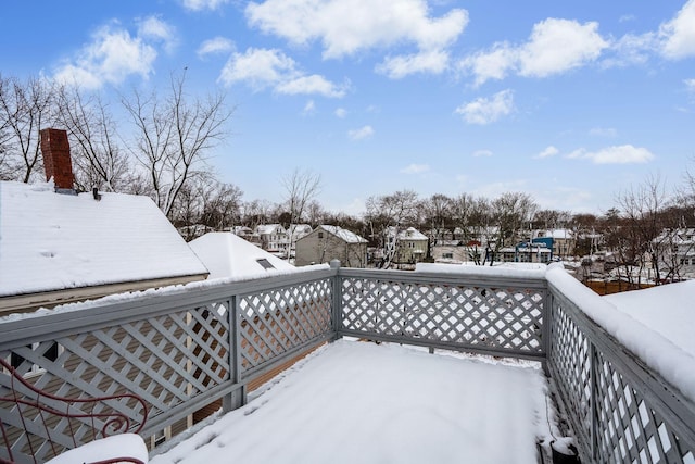 view of snow covered deck