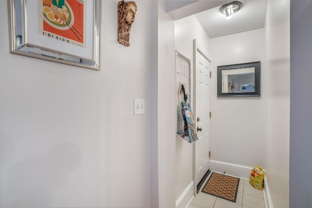 entryway featuring light tile patterned flooring