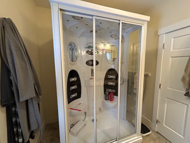 bathroom with an enclosed shower