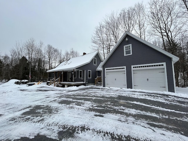 view of front of property with a garage and a porch