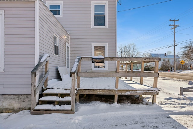 view of snow covered deck