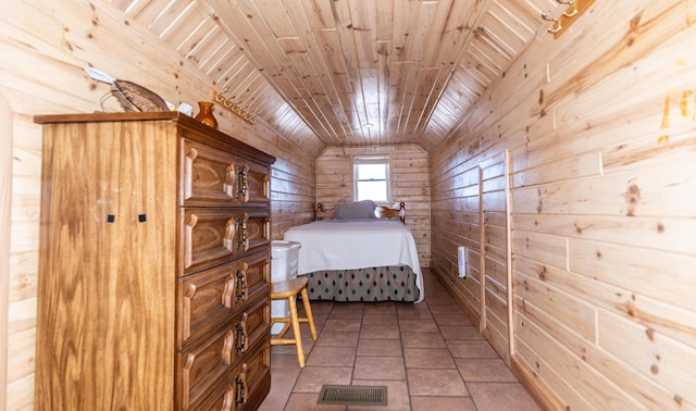 bedroom featuring wood ceiling, tile patterned floors, vaulted ceiling, and wood walls