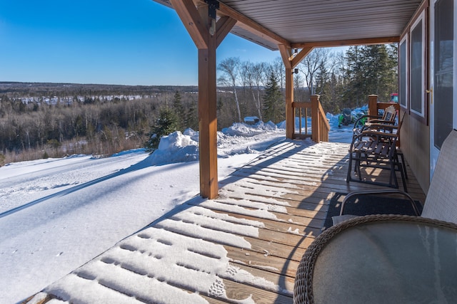 view of snow covered patio