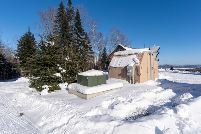 view of snow covered property