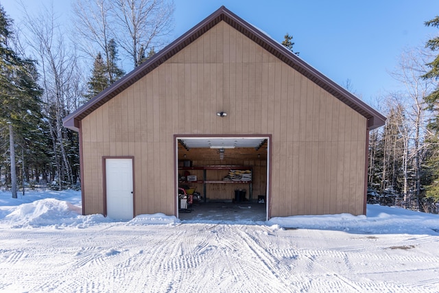 view of snow covered garage