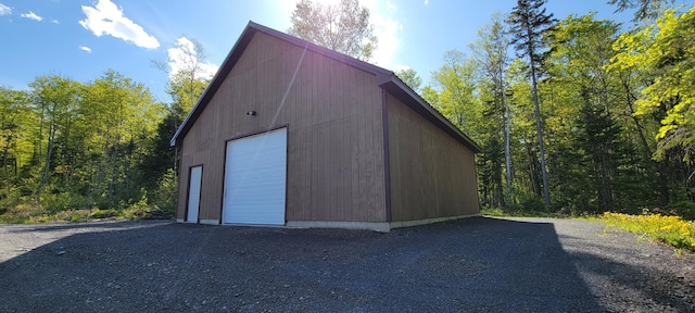 685 Main St, Grand Isle, ME 04746 - detached garage with a forest view