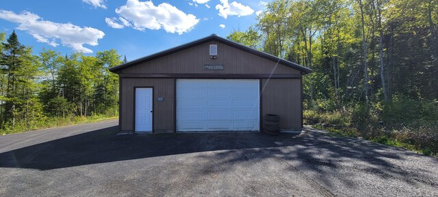 685 Main St, Grand Isle, ME 04746 - detached garage with a forest view