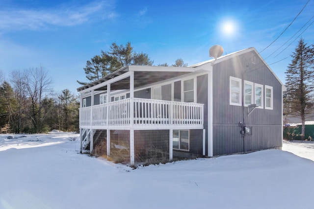 view of snow covered property