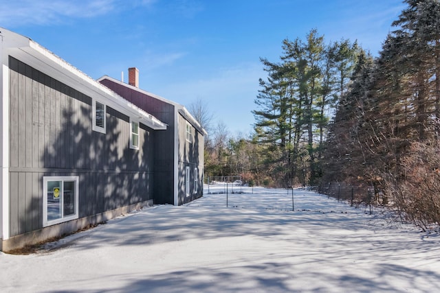 view of yard covered in snow