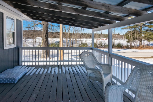 view of snow covered deck