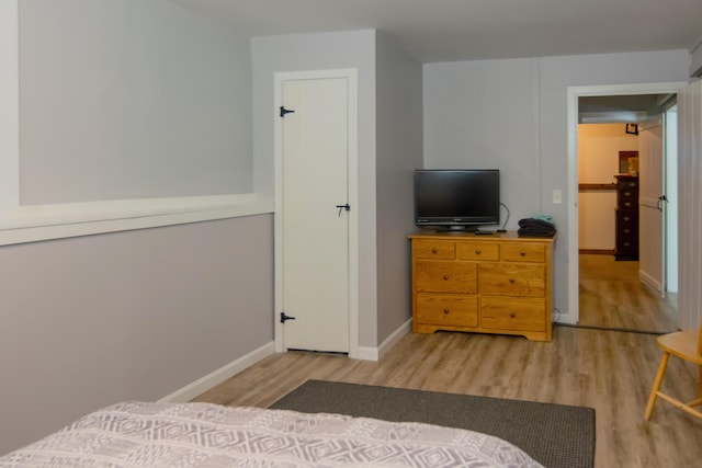 bedroom featuring light hardwood / wood-style floors