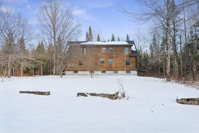 view of snow covered property