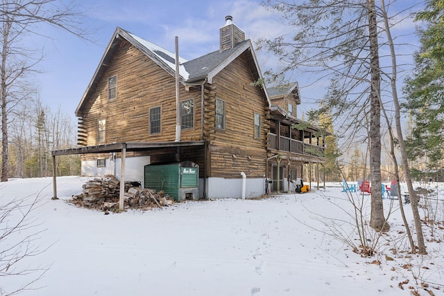 view of snow covered property