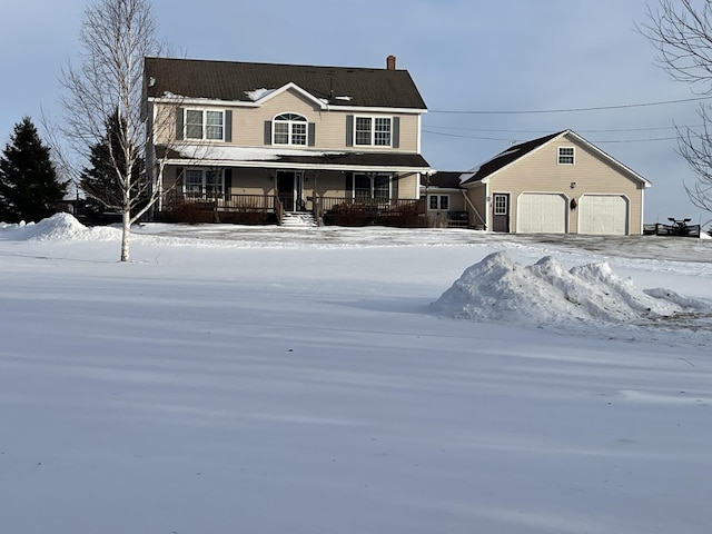 view of front of home with a garage and covered porch